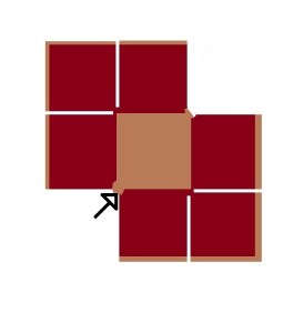 Fold the bottom left square diagonally up and to the right and place it over the central square.